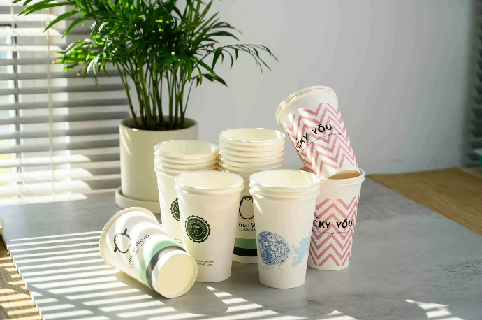 a group of cups with designs on them
